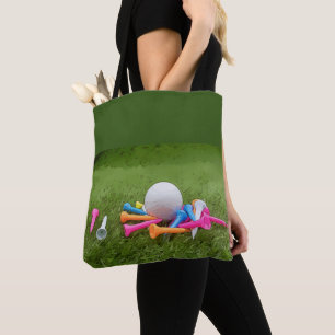 Der Golfplatz, der den Golfball und die bunten T-S Tasche