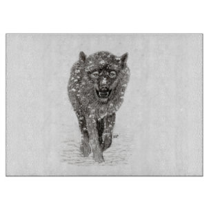 Der graue Schwarze Wolf im Schnee , der wilde Wint Schneidebrett