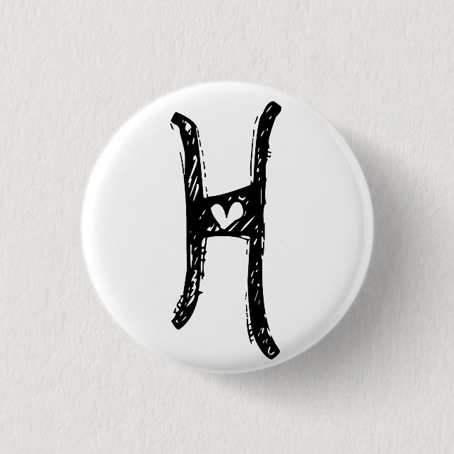 der h-Knopf Button (Vorderseite)
