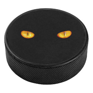 Der harte Blick auf die goldene Bombay-Katzenaugen Eishockey Puck