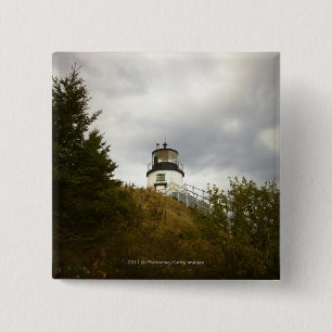 Der Hauptleuchtturm der Eule an einem bewölkten Button