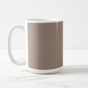 Der Hintergrund ist in verschiedenen Brauntönen ge Kaffeetasse