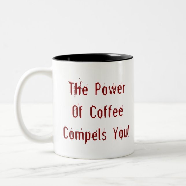 Der Kaffee zwingt dich rot Zweifarbige Tasse (Links)