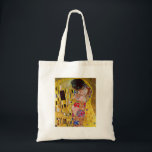 Der Kuss durch Gustav Klimt Tragetasche<br><div class="desc">Diese Malerei, die den Kuss betitelt wird, wird vom berühmten Künstler, Gustav Klimt gemacht. Über Gustav Klimt Gustav Klimt war ein österreichischer Symbolistmaler und der vorstehendsten Mitglieder der Wien-Sezessionsbewegung. Er wurde einer der Gründungsmitglieder und des Präsidenten der Dackel Sezession im Jahre 1897 und des periodischen das Ver der Gruppe Sacrum....</div>