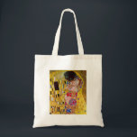 Der Kuss durch Gustav Klimt Tragetasche<br><div class="desc">Diese Malerei, die den Kuss betitelt wird, wird vom berühmten Künstler, Gustav Klimt gemacht. Über Gustav Klimt Gustav Klimt war ein österreichischer Symbolistmaler und der vorstehendsten Mitglieder der Wien-Sezessionsbewegung. Er wurde einer der Gründungsmitglieder und des Präsidenten der Dackel Sezession im Jahre 1897 und des periodischen das Ver der Gruppe Sacrum....</div>