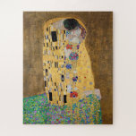 Der Kuss von Gustav Klimt<br><div class="desc">Der Kuss von Gustav Klimt Der Kuss ist ein Ölgemälde mit Goldblatt, Silber und Platin vom österreichischen Symbolik-Maler Gustav Klimt. Es wurde irgendwann in den Jahren 1907 und 1908 gemalt, auf dem Höhepunkt dessen, was Gelehrte seine "Goldene Periode" nennen. Mit schimmernden Goldtönen, stilisierten Formen und sentimentaler Ikonographie verzaubert der Kiss...</div>