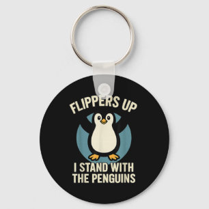 Der lustige Pinguin zieht mich hoch und steht mit  Schlüsselanhänger