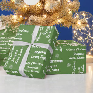 Der Name Ihres Kindes auf grünem Geschenkpapier vo
