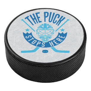 Der Puck hält hier Hockey Goalie Puck