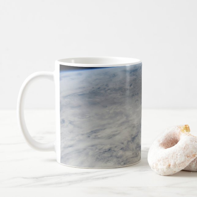 Der Schatten des Mondes, der auf dem Nordpazifik v Kaffeetasse (Mit Donut)