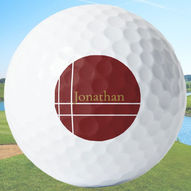 Der schlichte, dunkelrote und goldene individuelle golfball (Von Creator hochgeladen)