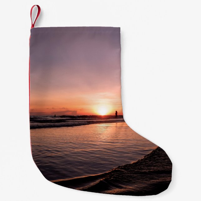 Der Sonnenuntergang am Strand ist dunkel, hell und Kleiner Weihnachtsstrumpf (Vorderseite)
