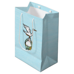 Der Storch trägt einen Baby Boy Blue Mittlere Geschenktüte