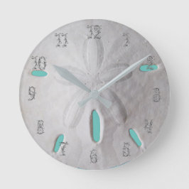 Der Strand des Sand-Dollar-Ozeans ist türkisblau Runde Wanduhr