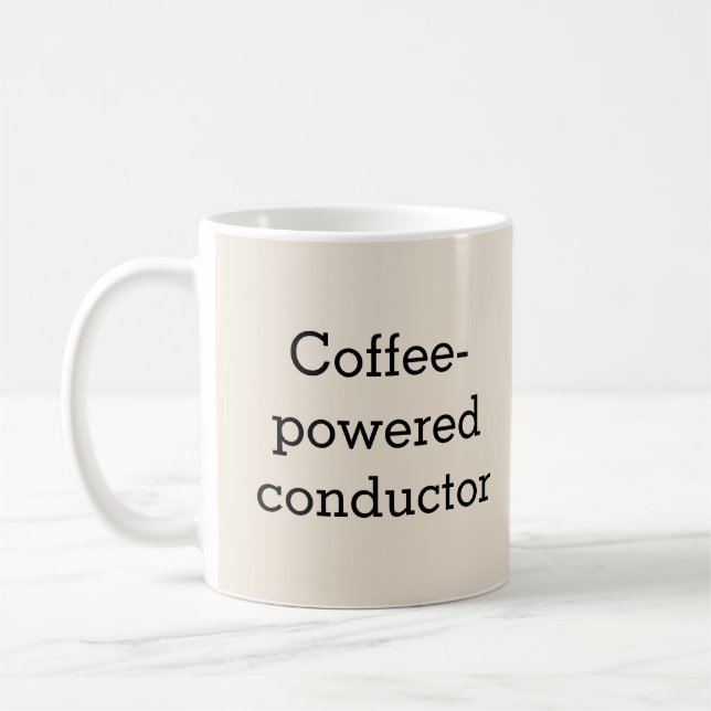 Der von Kaffee angetriebene Musiker Kaffeetasse (Links)