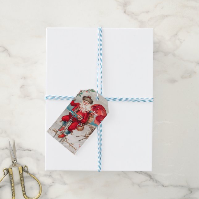 Der Weihnachtsmann auf einem Pfennig mit Rentier G Geschenkanhänger (Mit Garn)