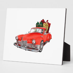 Der Weihnachtsmann fährt ein Retro-Auto mit Beglei Fotoplatte