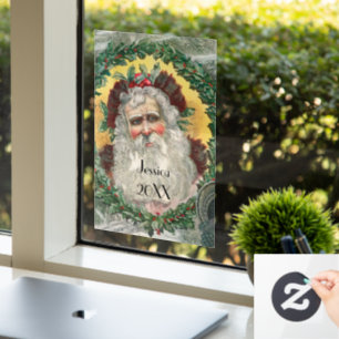 Der Weihnachtsmann mitten in einem Weihnachtsreich Fensteraufkleber
