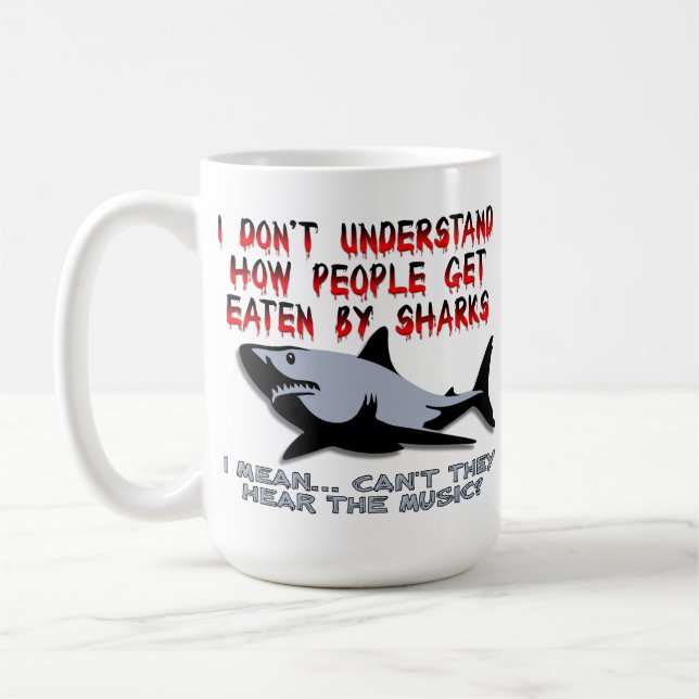 Des requins - entendez la tasse drôle de musique (Gauche)