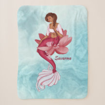 Desi pink mermaid sitting in a pink lotus flower