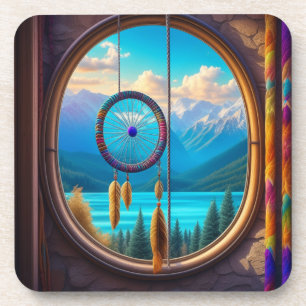 Dessous-de-verre Dreamcatcher dans une fenêtre donnant sur les mont