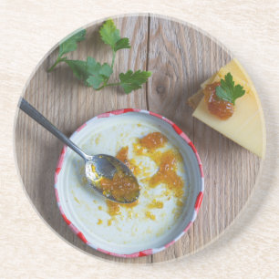 Dessous De Verre En Grès Confit oignon ananas sur bois rustique