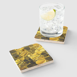 Dessous-de-verre En Pierre Jaune ou dorée, les pièces ressemblent à du métal