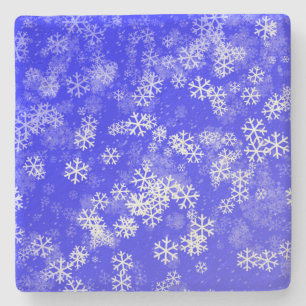 Dessous-de-verre En Pierre Les flocons de neige sur le Noël bleu