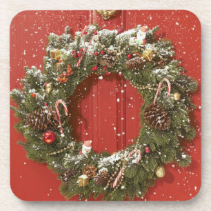 Dessous-de-verre Guirlande de Noël accrochant sur une porte