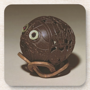 Dessous-de-verre La noix de coco a sculpté dans un visage, c.1895