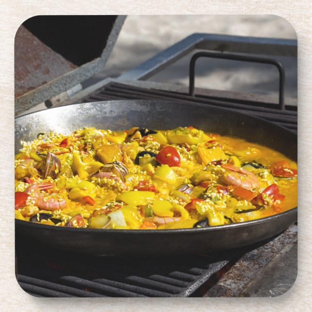 Dessous-de-verre La paella est cuite sur un grill (Devant)