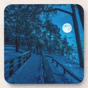 Dessous-de-verre Paysage d'hiver avec pinède enneigée