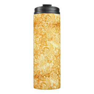 Detail des Goldlitzenmusters des Tuches Thermosbecher