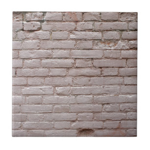 Detail einer Wand aus alten beigen Lehmziegeln Fliese