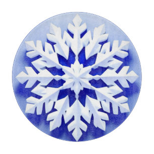 Detaillierte blaue Schneeflocke Schneidebrett