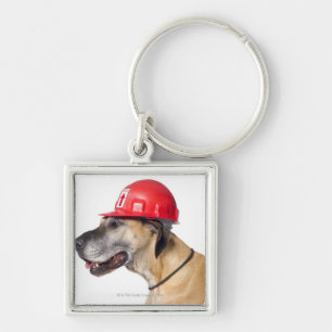 Deutsche Dogge, die einen roten Bausturzhelm träg Schlüsselanhänger