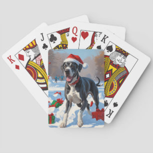 Deutsche Dogge läuft im Schnee mit Weihnachtshut Spielkarten
