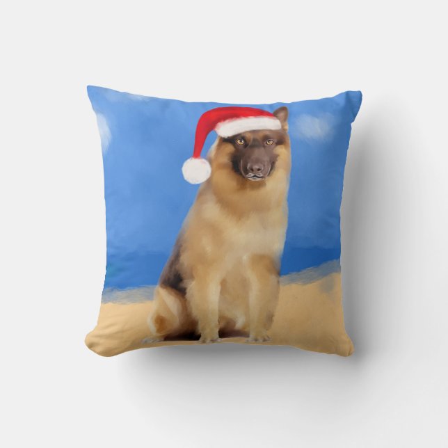 Deutscher Schäferhund sitzt auf der Weihnachtsmann Kissen (Vorderseite)