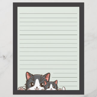 Deux chatons gris sur une doublée de papier gris