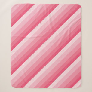 Diagonale Ombre-Streifen in rosa Tönen Sherpadecke