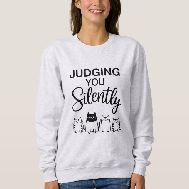 DICH STILL BEURTEILEND SWEATSHIRT (Vorderseite)