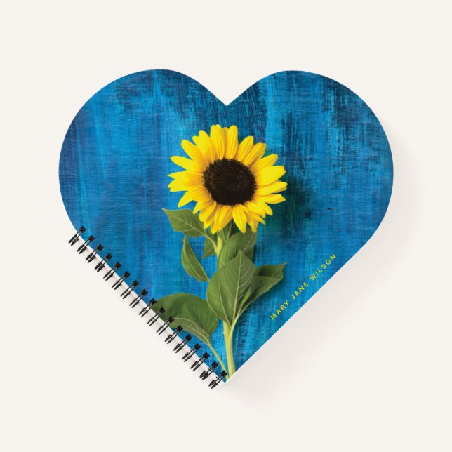 Dicke gelbe Sonnenblume auf blau Notizbuch (Vorderseite)