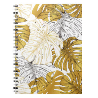 Dicken aus einer Monstera-Pflanze. Bild des Golden Notizblock