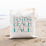 Die Aussicht auf den Strand | Sommertypografie Tragetasche<br><div class="desc">Fantastische Aussicht auf den ruhigen Strand! Unser lustiges Sommerdesign illustriert genau,  was mit Ihrem Ruhegesicht,  um,  "betch" Gesicht passiert,  wenn der Sommer herumläuft. Niedliche Typografie-Totentasche für den Pop Kulturliebhaber in Ihrem Leben bietet "ruhende Strand Gesicht" in schwarz und pool blau Schrift.</div>