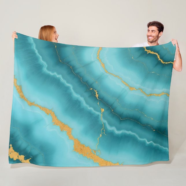 Die beliebte türkisfarbene Blue-Gold-Marmorsammlun Fleecedecke (Beispiel)