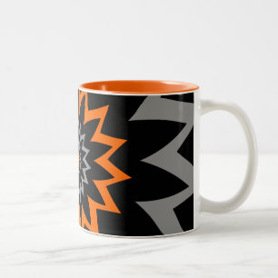 Die blühende Ausdehnung:  Schwarzes und Orange Zweifarbige Tasse