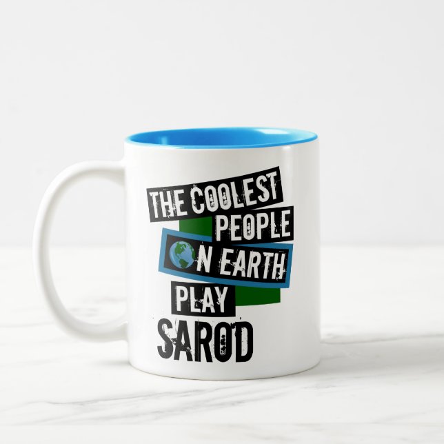 Die Coolsten Menschen der Erde spielen Sarod Zweifarbige Tasse (Links)