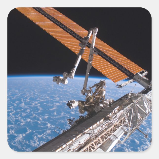 Die Flügel der Canadarm2- und Solarpaneele Quadratischer Aufkleber (Vorderseite)