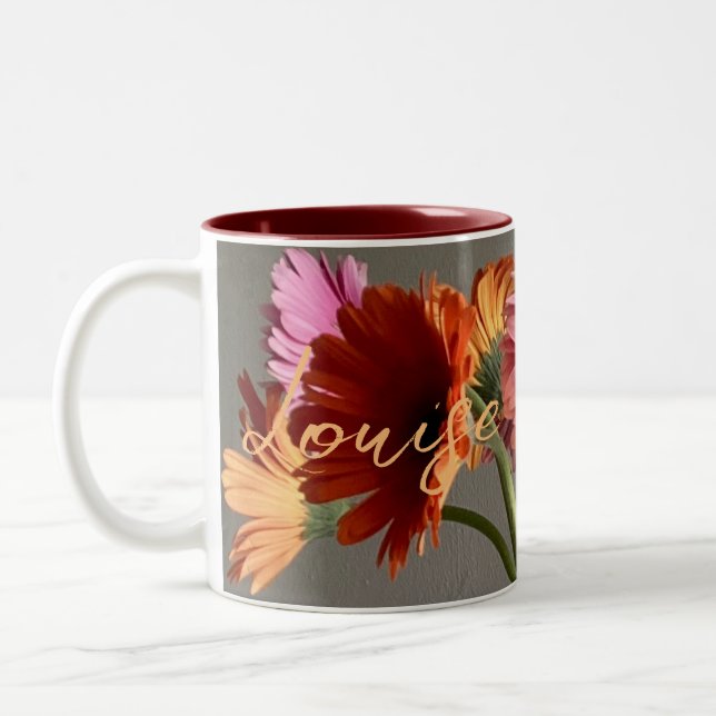Die fröhliche Gerbera Blume + Individuelle Name Zweifarbige Tasse (Links)
