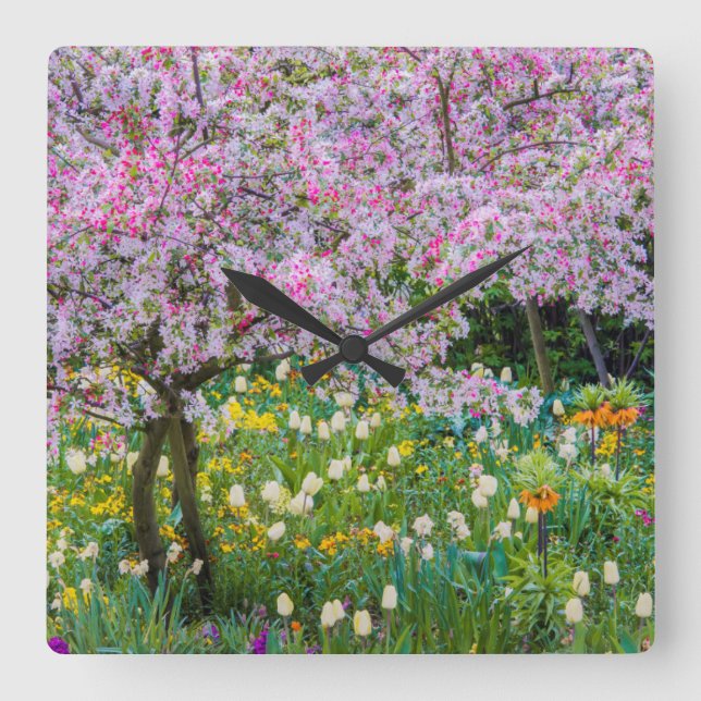 Die Frühlingszeit im Garten von Claude Monet Quadratische Wanduhr (Vorderseite)